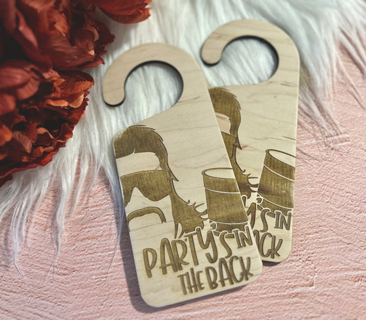 Party's in the back knob hanging