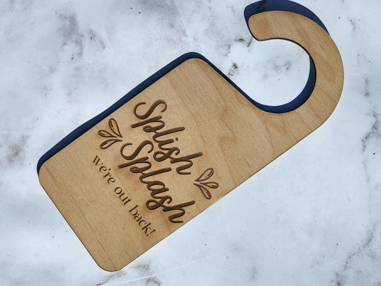 Splish splash door hanger