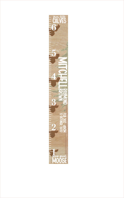 Wooden growth chart with moose design and measurements on a white background