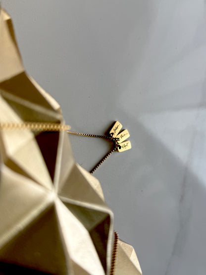 Gold necklace on a white background