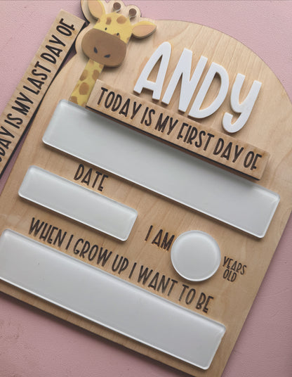 Wooden plaque with text and a giraffe design on a pink background
