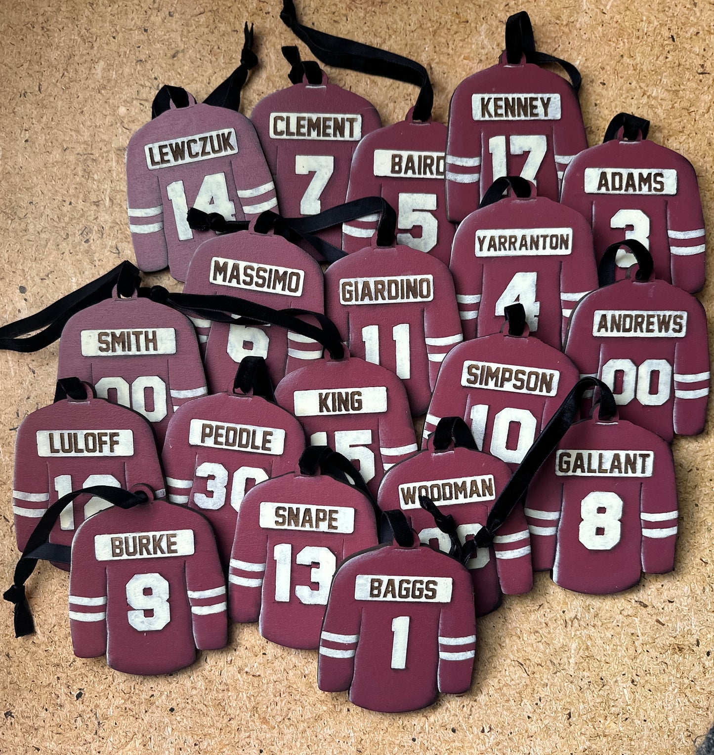Hand Painted Jerseys featuring clients numbers and last names in the jersey colour of your choice. 