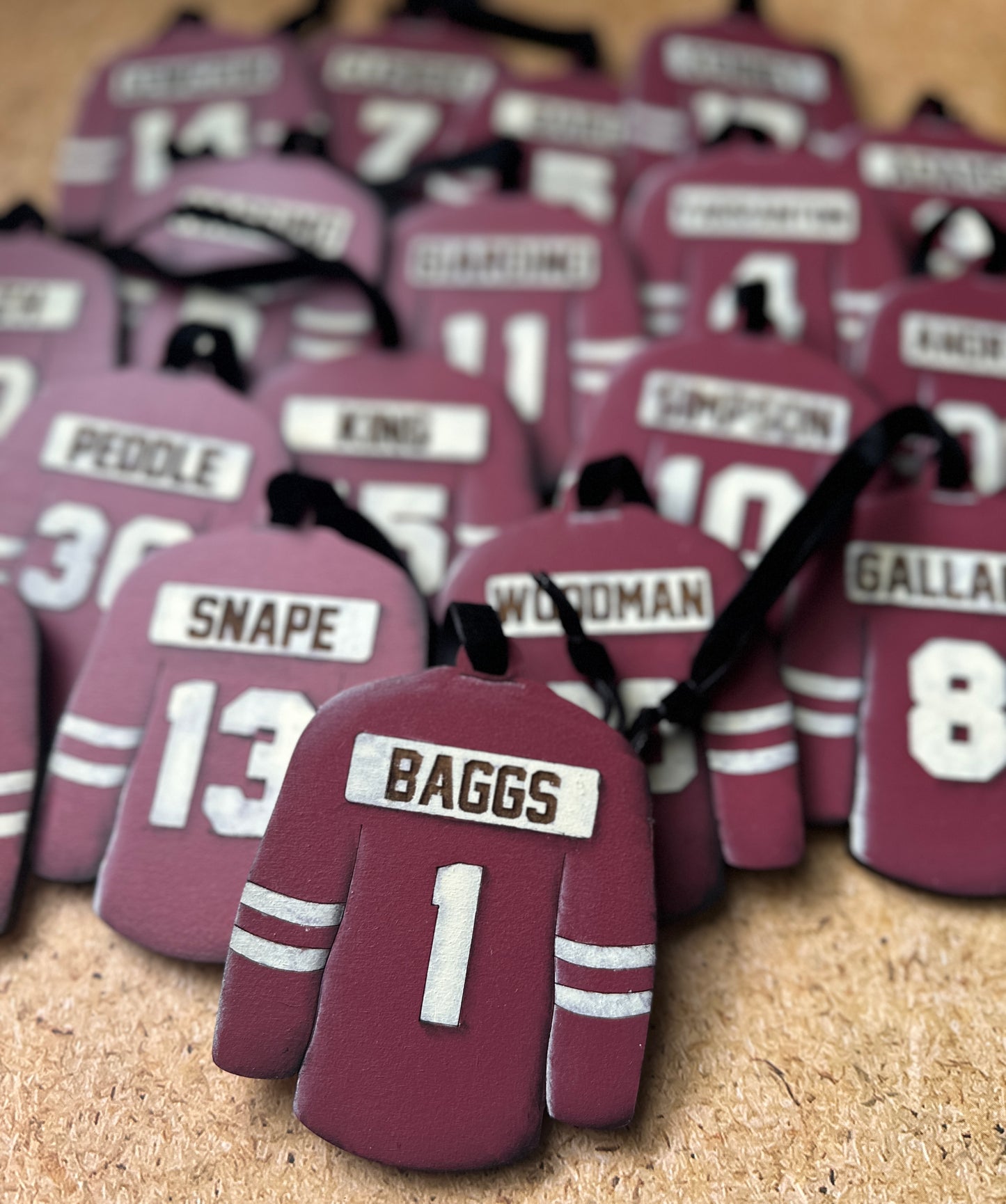 Hand Painted Jerseys featuring clients numbers and last names in the jersey colour of your choice. 