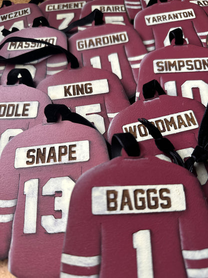 Hand Painted Jerseys featuring clients numbers and last names in the jersey colour of your choice. 